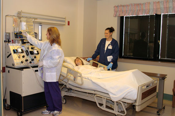 Stacey Walsh, R.N. (left), apheresis nurse, and Erin Staffileno, apheresis technician